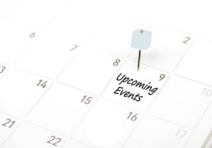 calendar with pin marking upcoming event date